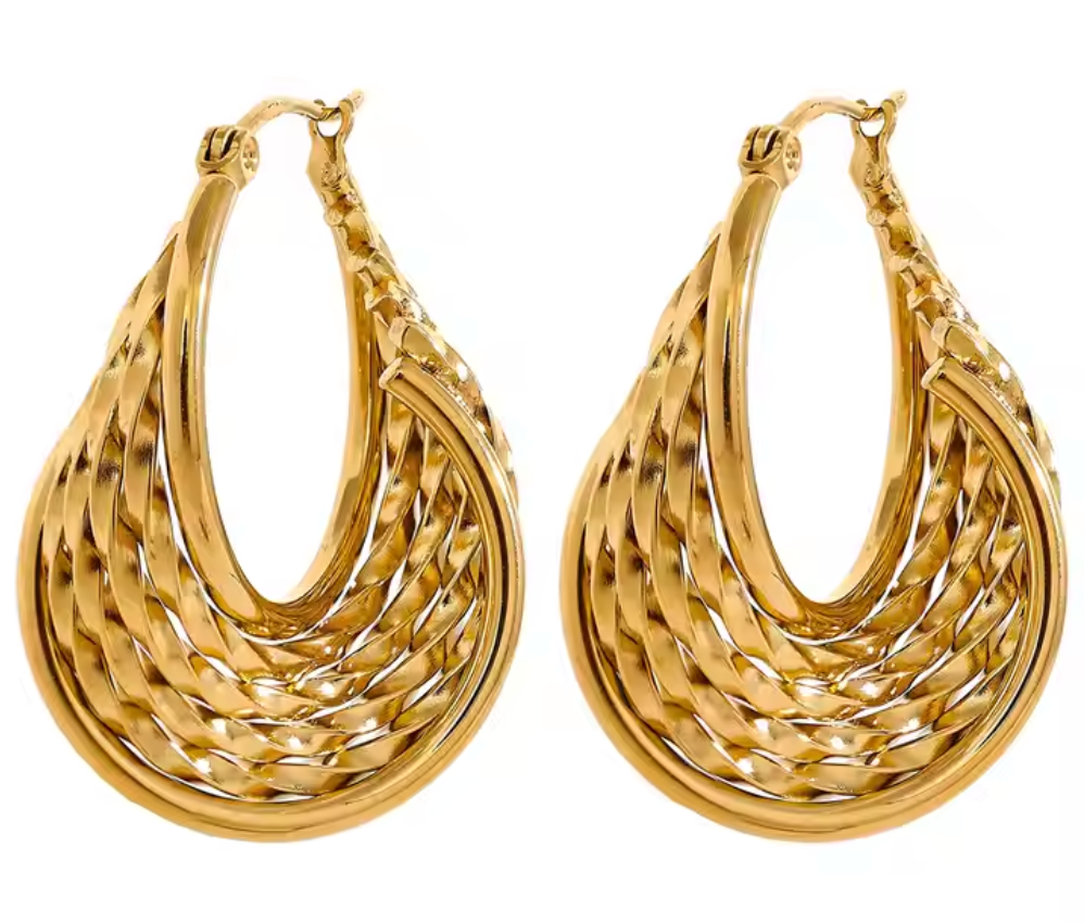 Calypso Earring – Luxe twisted design with sculptural shine, 1.38" length, tarnish-resistant, swim-safe, perfect for elevating any getaway look.