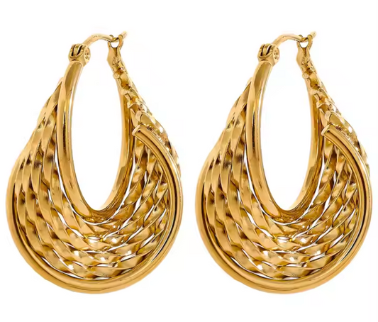 Calypso Earring – Luxe twisted design with sculptural shine, 1.38" length, tarnish-resistant, swim-safe, perfect for elevating any getaway look.