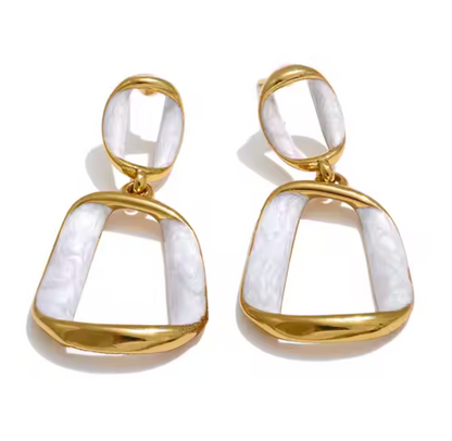 Gold-plated earrings with pearl white enamel in an irregular rectangle shape, featuring a luminous finish and sculptural design from RESORT 444.